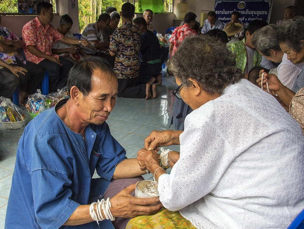 Songkran festival in Thailand showing respect for elders and cultural tradition shaping democracy