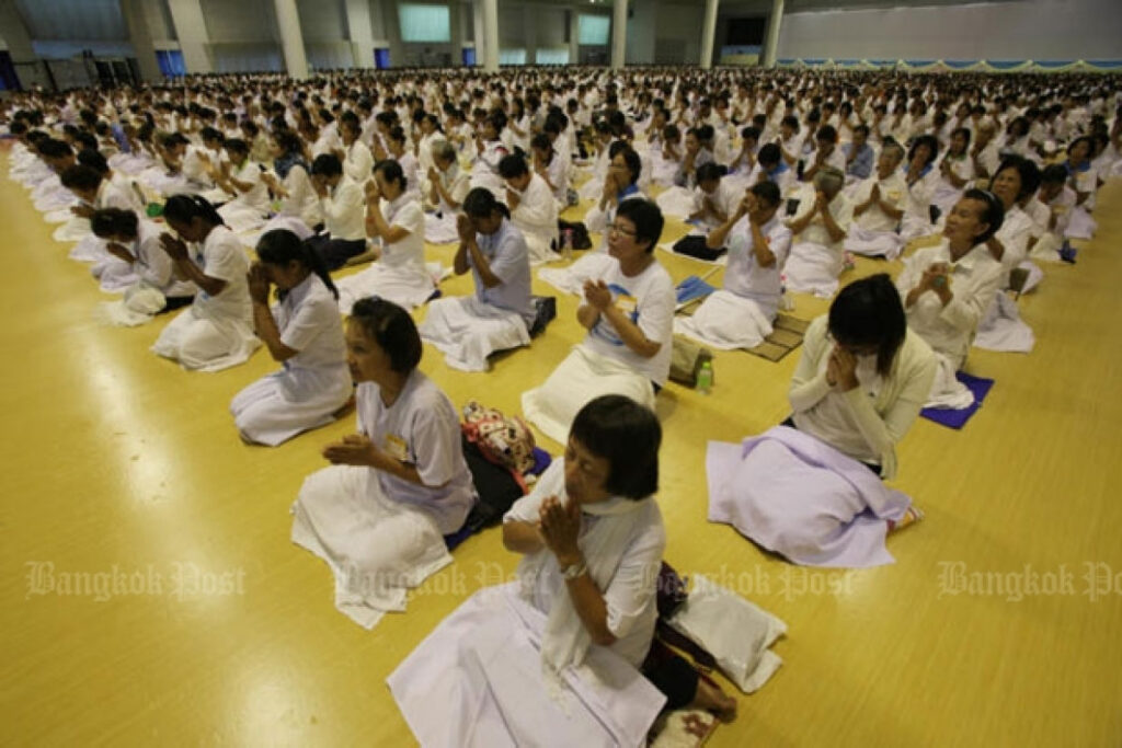 Thais meditating before the "Thai abbot escapes justice" headline hit the news.
