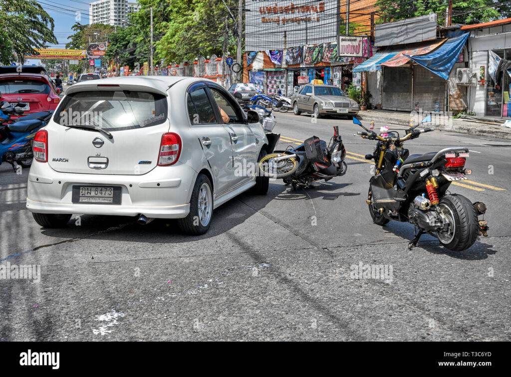 Not related to my true story, but shows a motorbike crashing into a car that's puling out of a parking space causing damage to the car