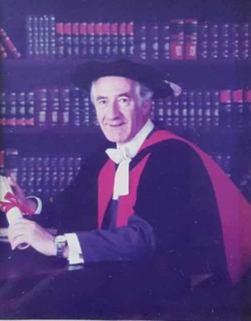 Matt Owens Rees in doctoral robes, Thailand, 20-year expatriate cultural anthropologist