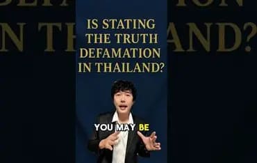 Lawyer seated at a desk, explaining that under Thai defamation law, even truthful statements can be illegal if they damage a person's character or business standing.